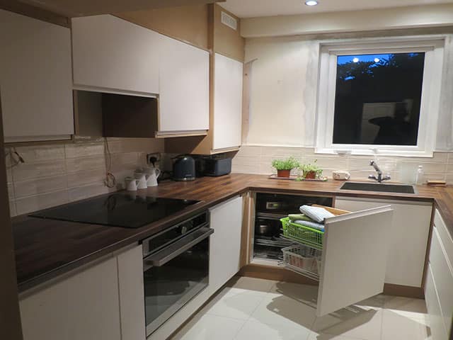 Kitchen with cupboard door open